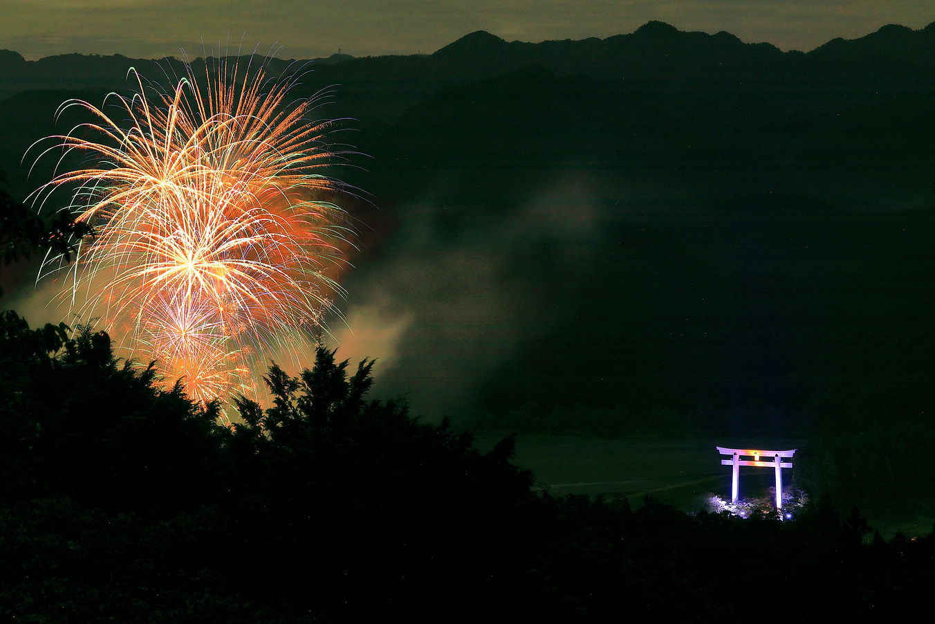 Fireworks above the great torii at Oyunohara